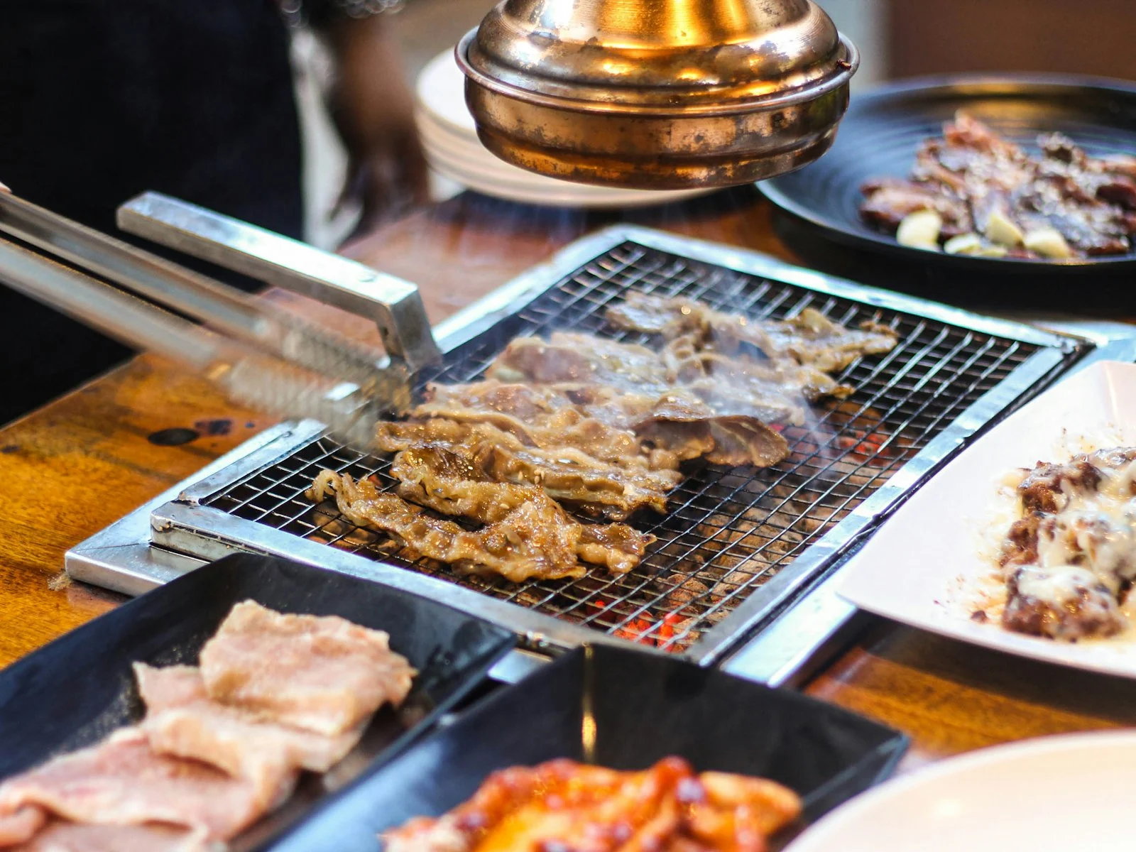 Meat grilling on a Korean BBQ grill