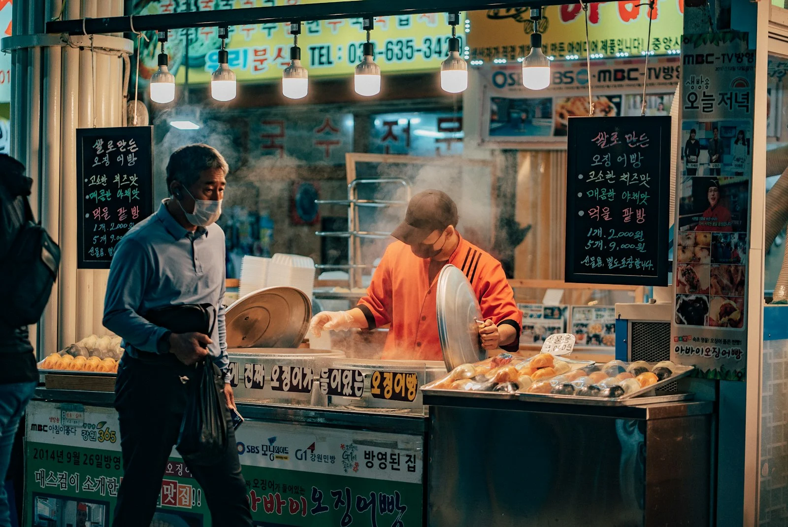 Steaming food stall at a market in Sokcho
